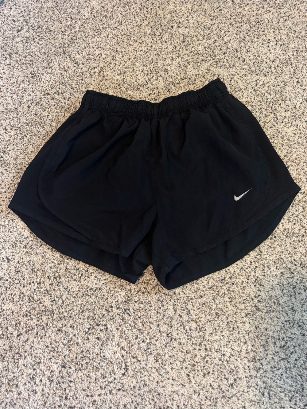 Black Nike running shorts